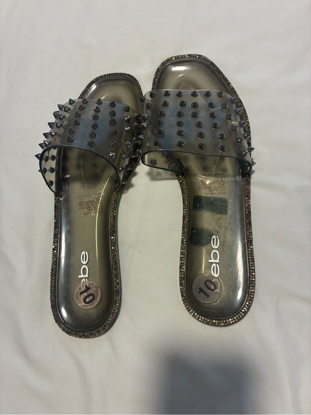 bebe Smoke Clear Spike Slide Sandals